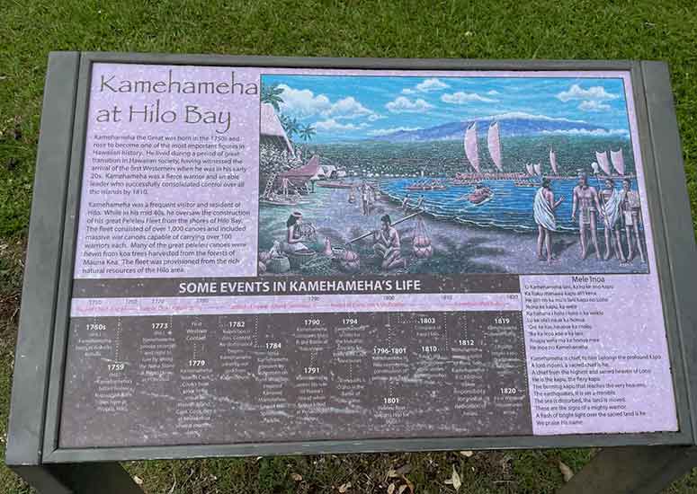 Information at fourteen-foot bronze statue of King Kamehameha in Wailoa River State Park