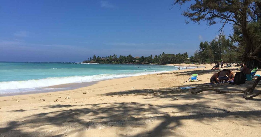 Beach, Maui with blue ocean and white sand.