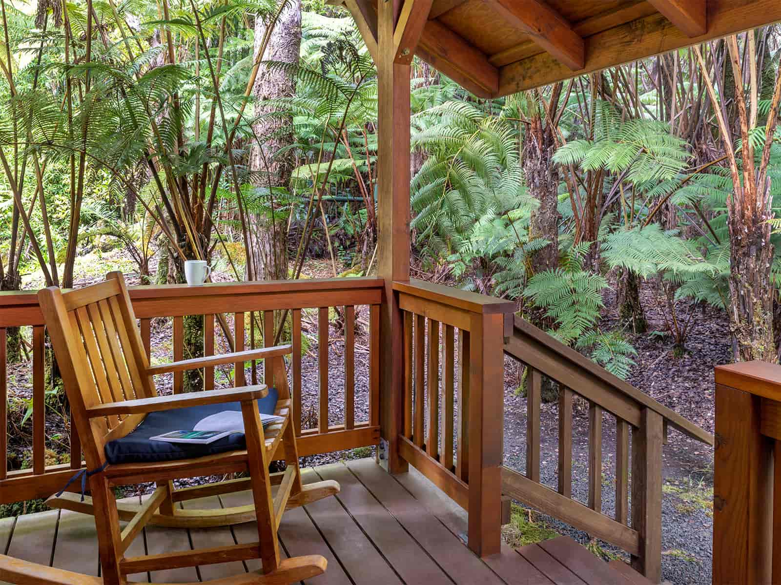 Hale Manaluna Porch with Rocking Chair and green vegetation all around